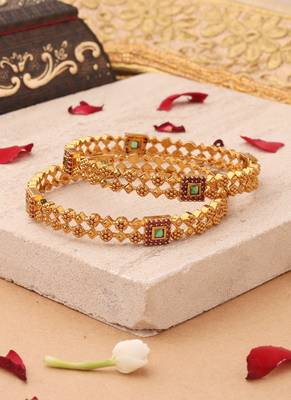 Whimsical Elegance: Gold-Plated Bangles with Delicate Shapes and Floral Accents 2