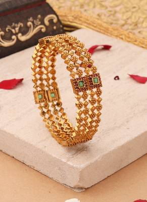 Whimsical Elegance: Gold-Plated Bangles with Delicate Shapes and Floral Accents 3