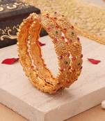 Divine Elegance: Gold-Plated Bangles with Lakshmi Motifs and Gemstone Accents