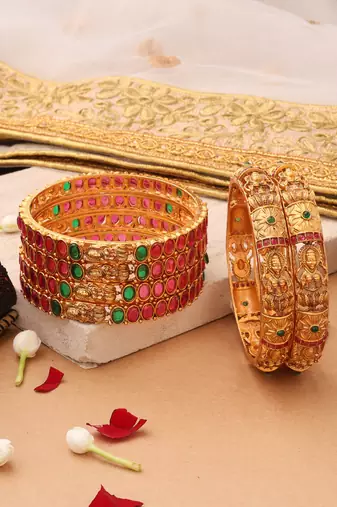 Goddess Radiance: Broad Gold-Plated Bangle with Intricate Motif and Gemstone Accents
