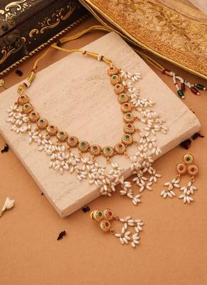 Radiant Reverie: Gold Cup Necklace with Red Stones and White Oval Jhumkis 1