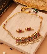 Royal Radiance: Red & Green Stone Necklace with Golden Jhumkis and Bead Accents