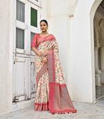Tussar silk saree with contrast zari woven Border and contrast zari pallu with prints and zari woven blouse piece.