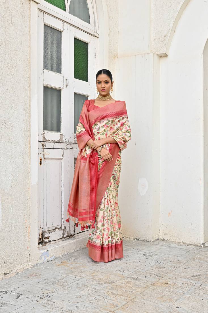 Tussar silk saree with contrast zari woven Border and contrast zari pallu with prints and zari woven blouse piece.