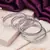 Modern Fusion: Silver Bangles with Square Diamond Engravings