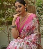 Off white kota doria/polyester floral print golden zari border saree with unstitched blouse piece