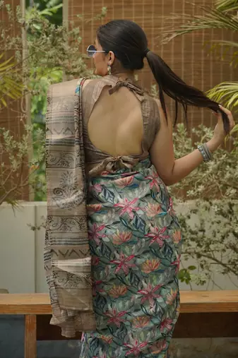 Dusty green cotton blend floral print golden woven border saree with unstitched blouse piece