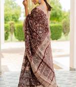 Maroon cotton blend floral print/kalamkari print golden woven border saree with unstitched blouse piece