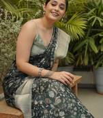 Dark green cotton blend floral print/kalamkari print golden woven border saree with unstitched blouse piece