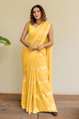 Light yellow georgette solid/ tassels golden zari woven border saree with unstitched blouse piece 1