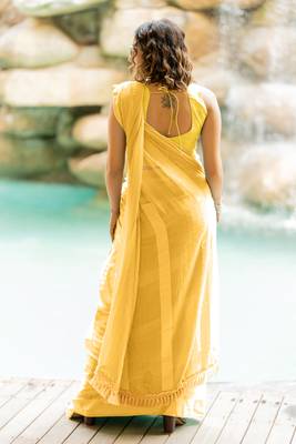 Light yellow georgette solid/ tassels golden zari woven border saree with unstitched blouse piece 4