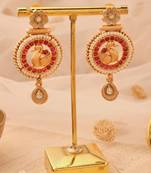 Gold-Plated Peacock Earrings with Red Stones & Pastel Flower Jhumkis