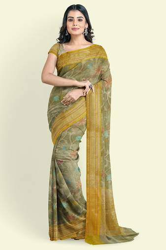 Green woven organza saree with blouse