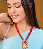 red beaded necklace with gold plated pendant