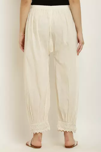 Pavonine off-white color afghani style lace hem cotton fabric palazzo for women