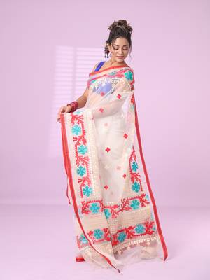 Off white muslin soft saree with embroidered work 2