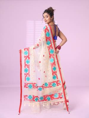 Off white muslin soft saree with embroidered work 3