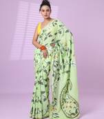 Light green cotton soft saree with foliage design