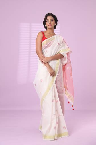 Off white cotton silk saree with zari border