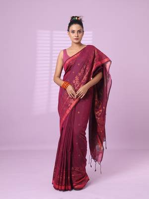 Magenta cotton handspun soft saree with zari woven texture pattern 1