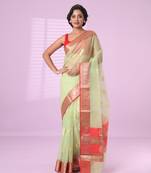 Green organza saree with zari weave border