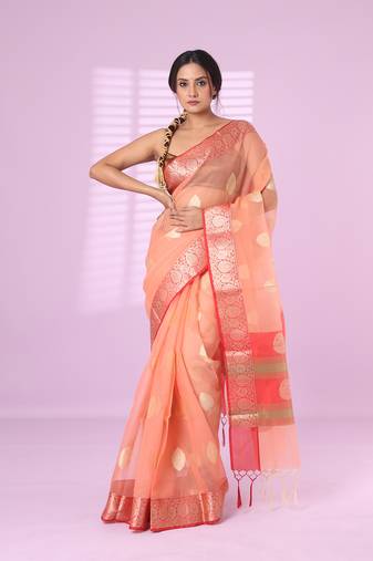 Peach organza saree with zari weave border