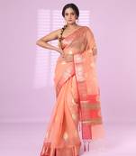 Peach organza saree with zari weave border