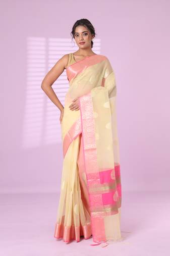 Beige organza saree with zari weave border