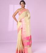 Beige organza saree with zari weave border