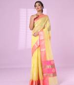 Yellow organza saree with zari weave border