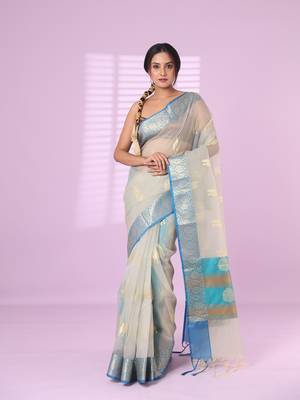 Ecru organza saree with zari weave border 1