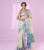 Ecru organza saree with zari weave border