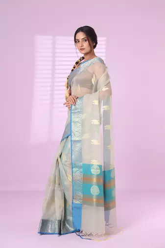 Ecru organza saree with zari weave border