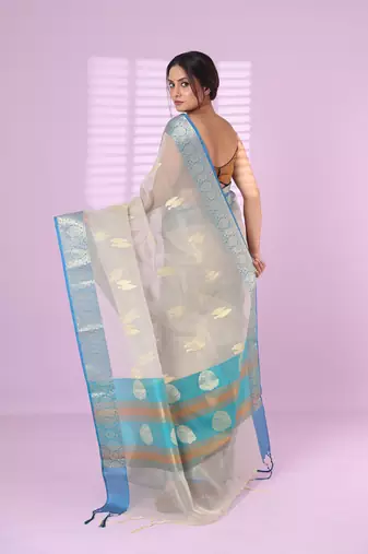 Ecru organza saree with zari weave border
