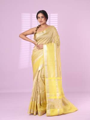 Yellow crush tissue saree with zari border 1