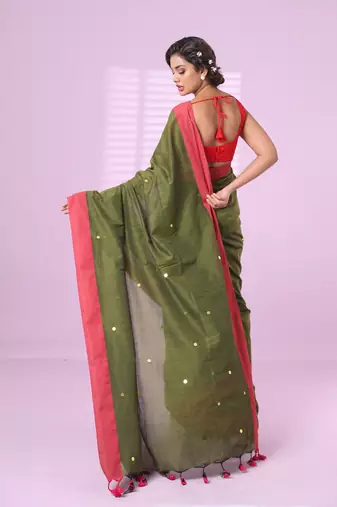 Sap green cotton sequence work soft saree with contrast border