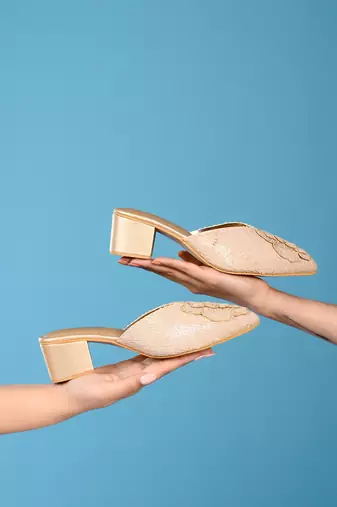 Valentina in beige heels