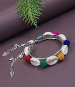 silver oxidised colorful pom-pom & cowrie shell adjustable cuff kada bracelet