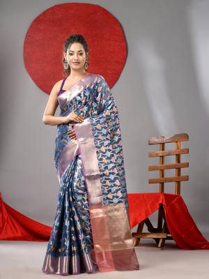 Blue organza saree with  allover multicolor flower 1