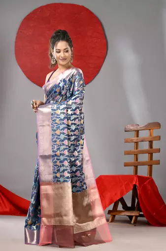 Blue organza saree with  allover multicolor flower