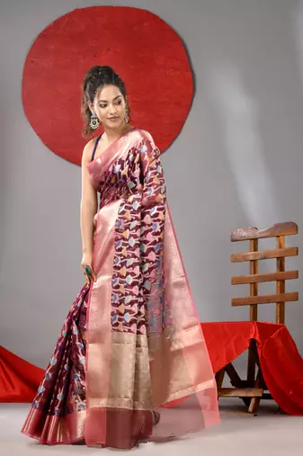 Magenta organza saree with  allover multicolor flower