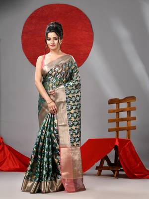 Dark green organza saree with  allover multicolor flower 1