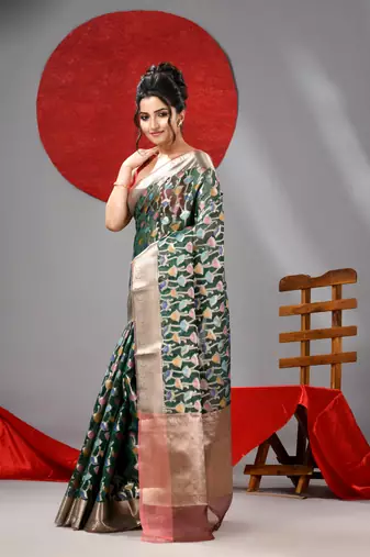 Dark green organza saree with  allover multicolor flower