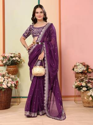 Purple embroidered georgette saree with blouse. 1