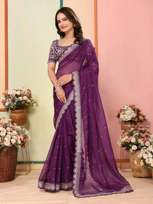 Purple embroidered georgette saree with blouse. 2