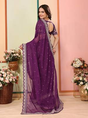 Purple embroidered georgette saree with blouse. 3