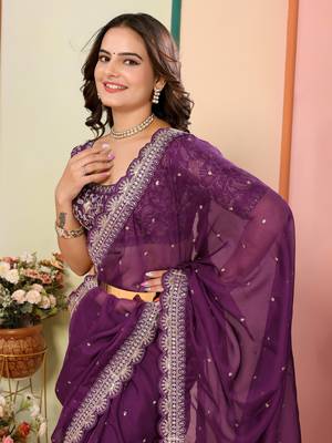 Purple embroidered georgette saree with blouse. 4