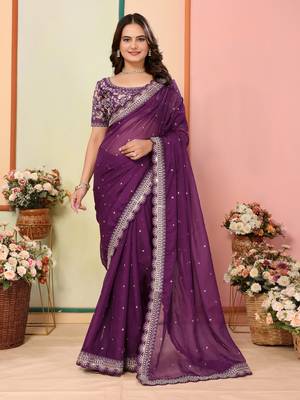 Purple embroidered georgette saree with blouse. 5