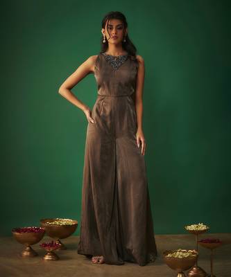 Grey flared jumpsuit with embroidered neck 1