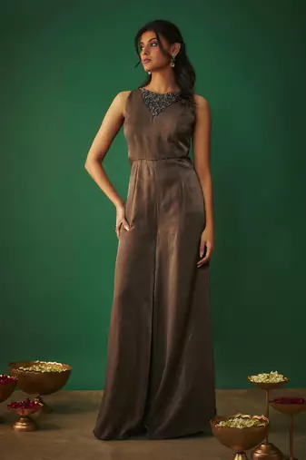 Grey flared jumpsuit with embroidered neck